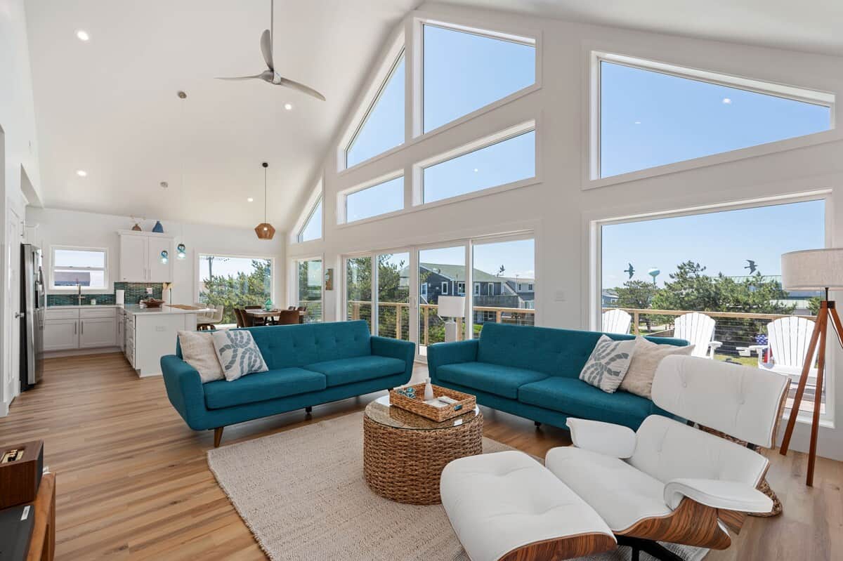 The Great room with a wall of windows.  