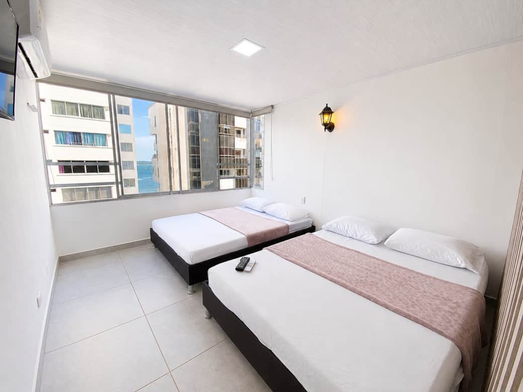 Habitación con dos camas dobles