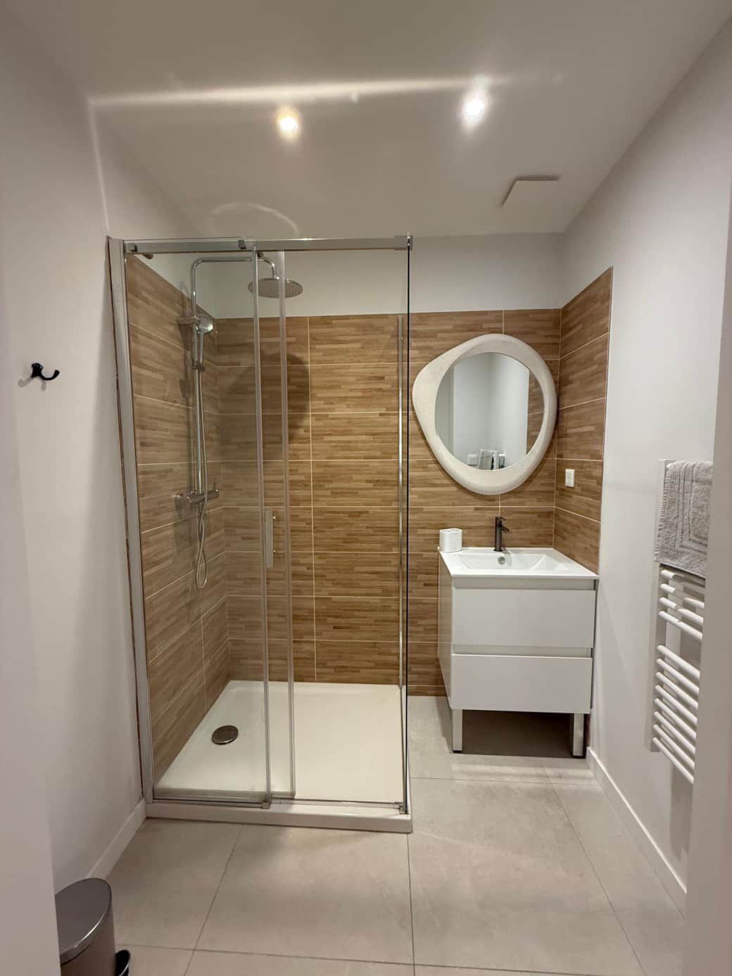 Bathroom with shower and towels provided.