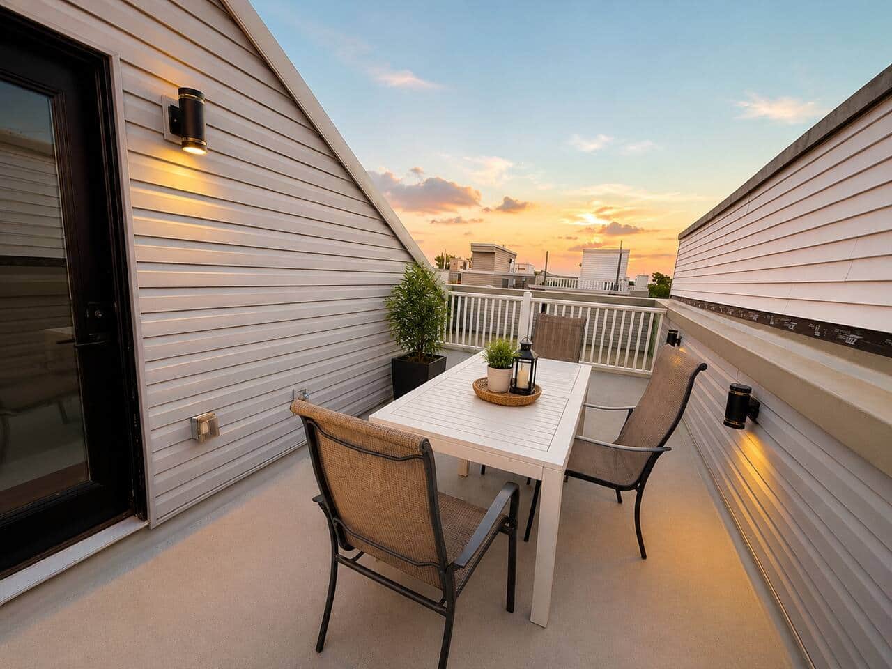 private rooftop with beautiful views and an outdoor dining table.