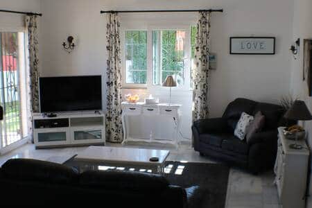 Lounge area with DVD player, board games and TV Lounge area with DVD player, board games and TV
