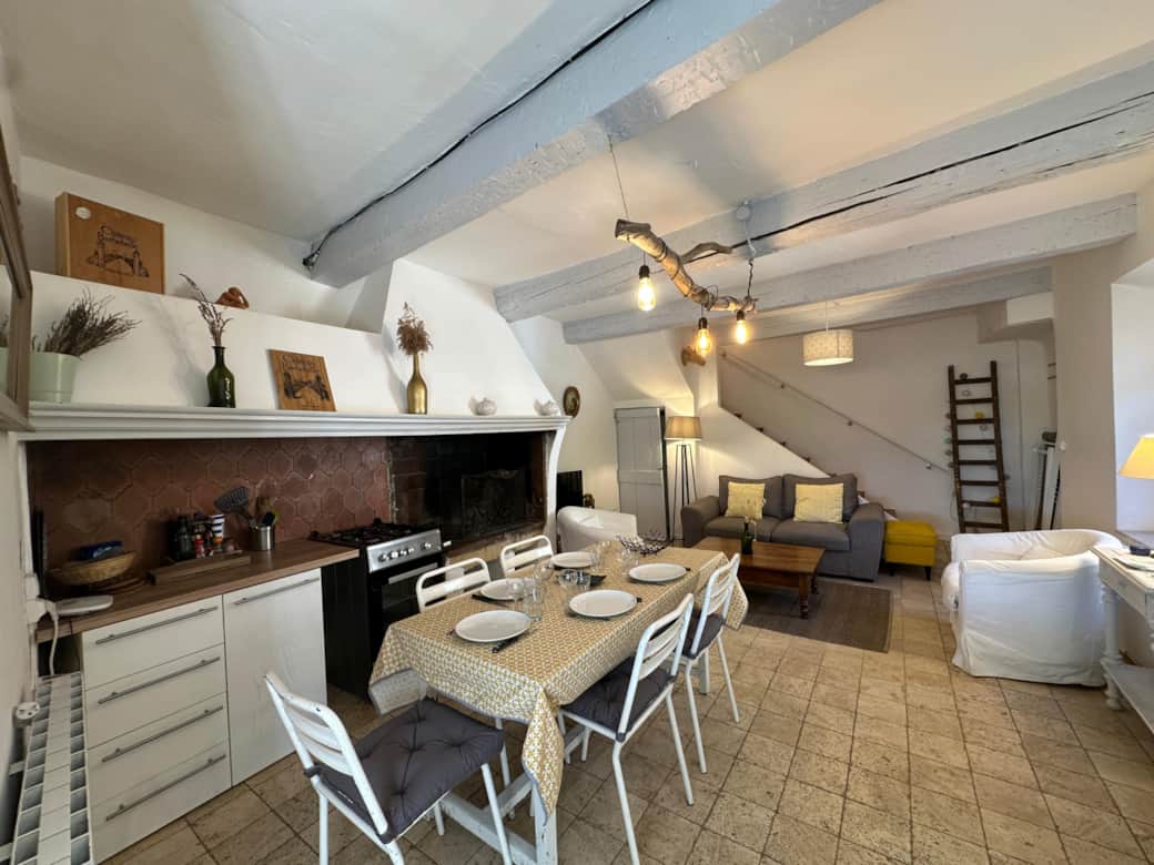 dining area, kitchen, table, living room, sofa, oven, TV