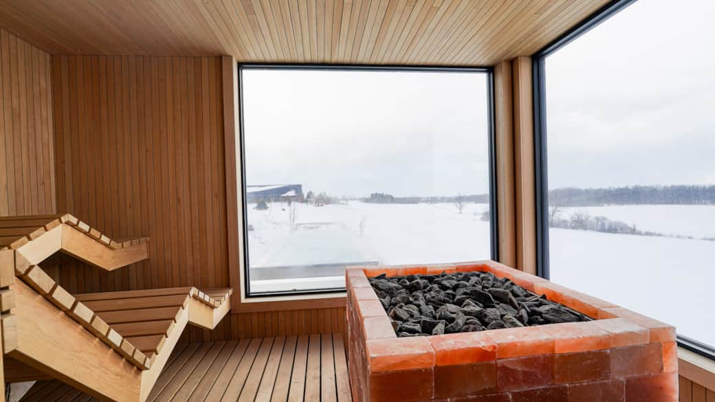 Panoramic Sauna Windows Overlooking the Cold Plunge & Thermal Pool and Country Landscape