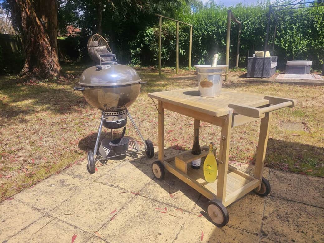 Enjoy outdoor dining with fire pit, lots of seating, BBQ, table, and sofas
