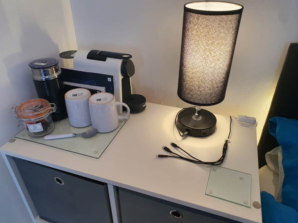 Nespresso coffee maker, phone chargers