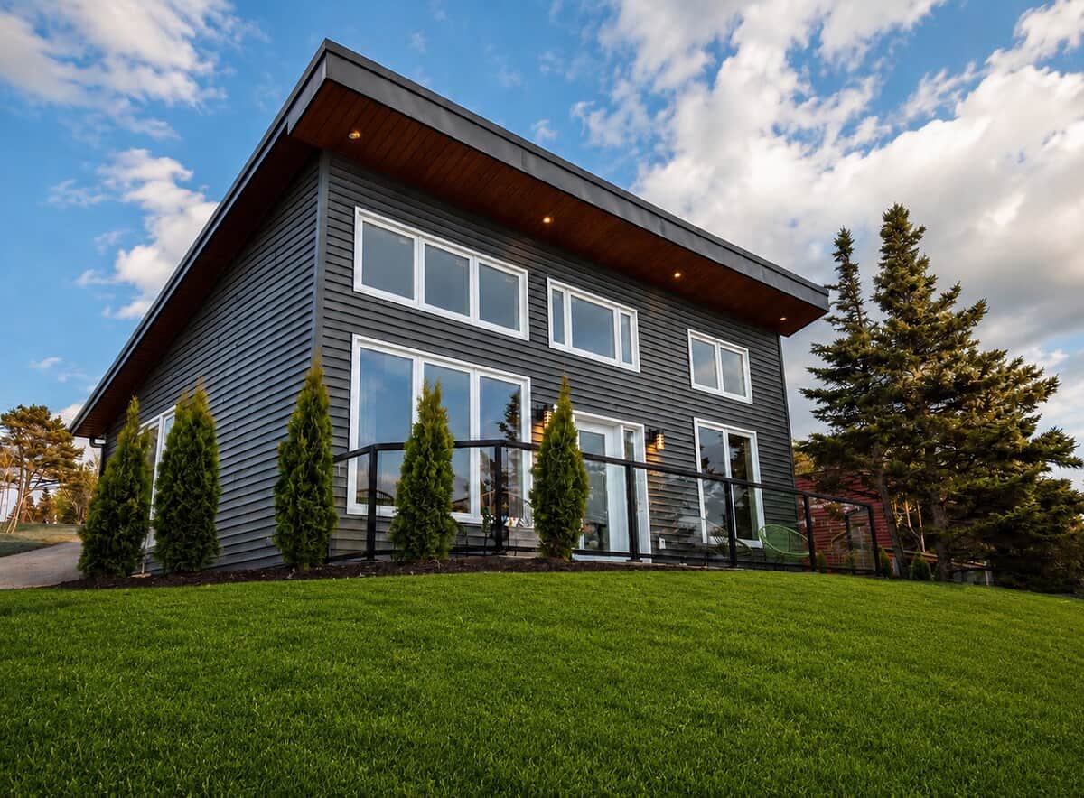 Note: Exterior lawn areas were recently seeded at the time of photography. Some images have been lightly enhanced to reflect the landscaping as it matures.