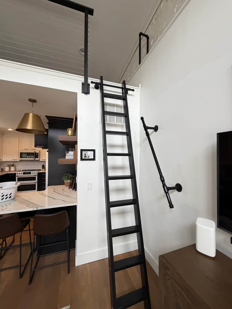 Loft via ladder with open entry. Not for kids or limited mobility. Use care—at your own risk.