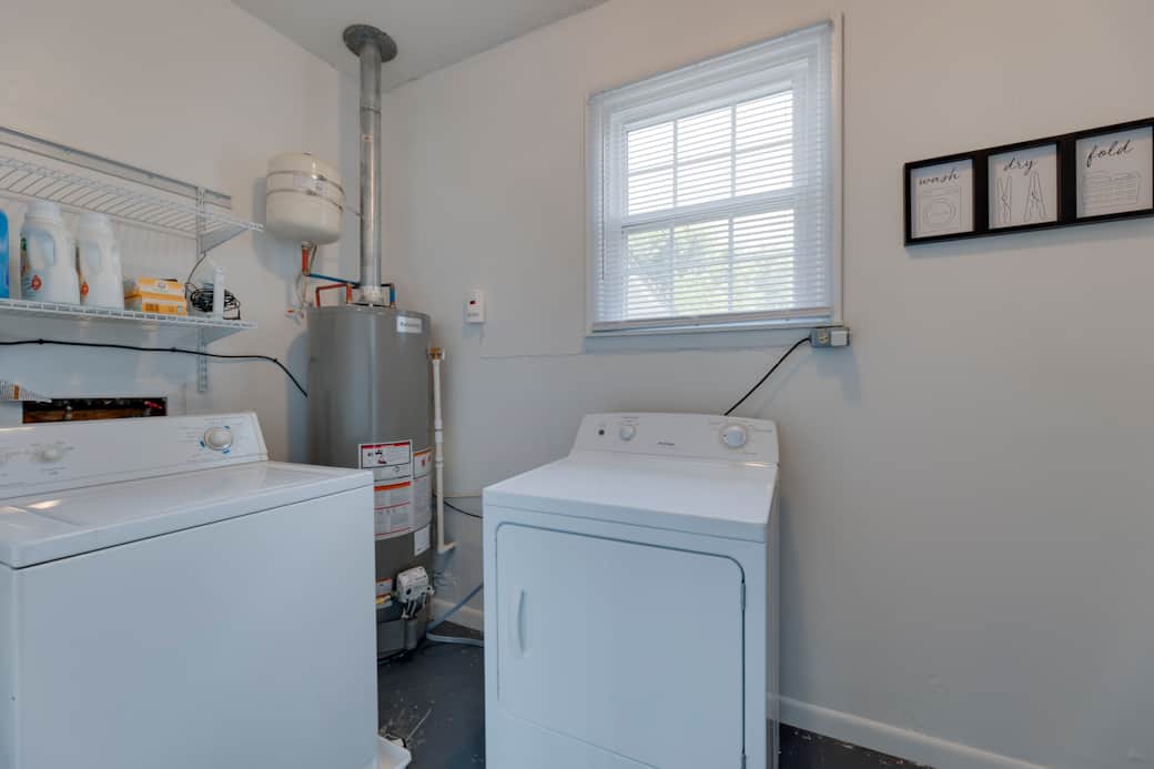 Laundry Room. Washer, Dryer, Iron, Ironing Board.