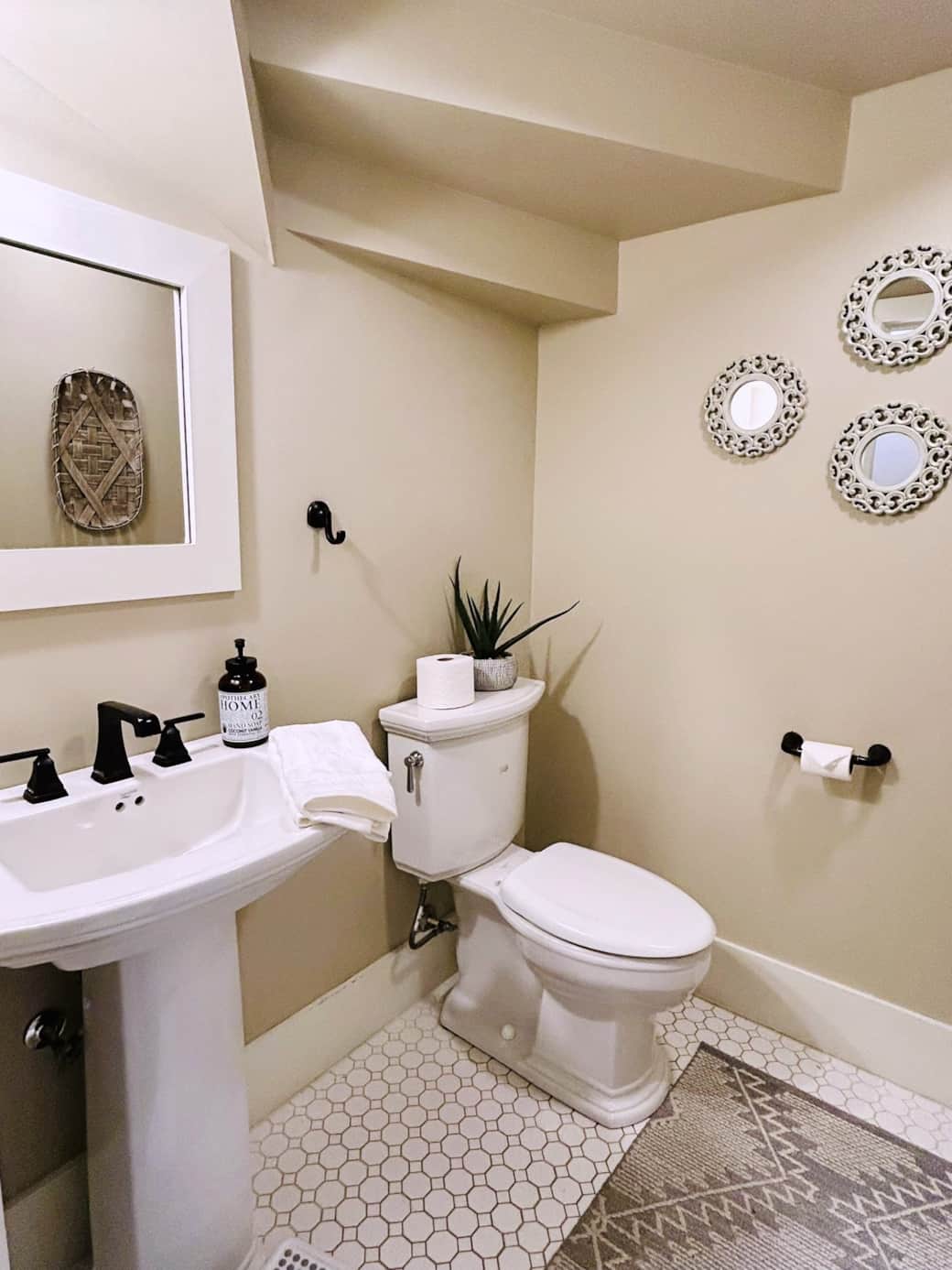 Enjoy the privacy and convenience of the downstairs half bath.