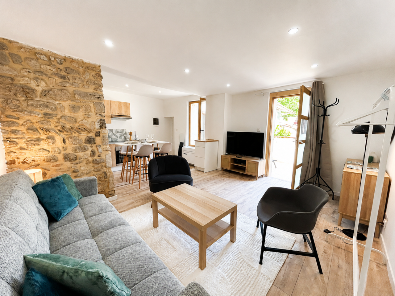 Living room, kitchen, table, television, sofa