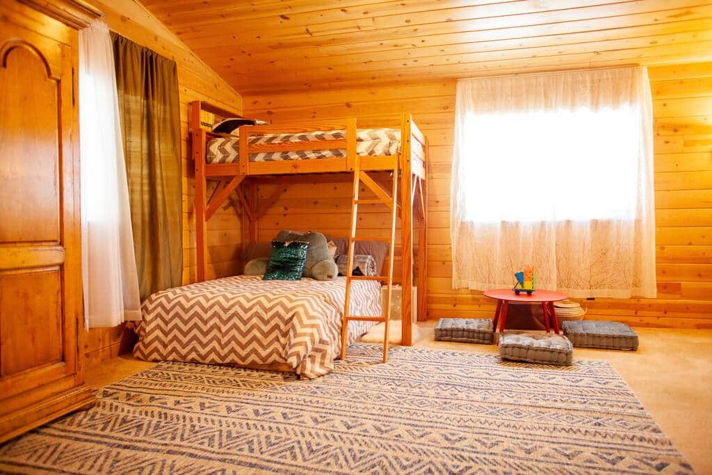 Twin loft bed and queen below, opposite King bed. Open floor-plan (no walls separating the beds). Twin loft bed and queen below, opposite King bed. Open floor-plan (no walls separating the beds).