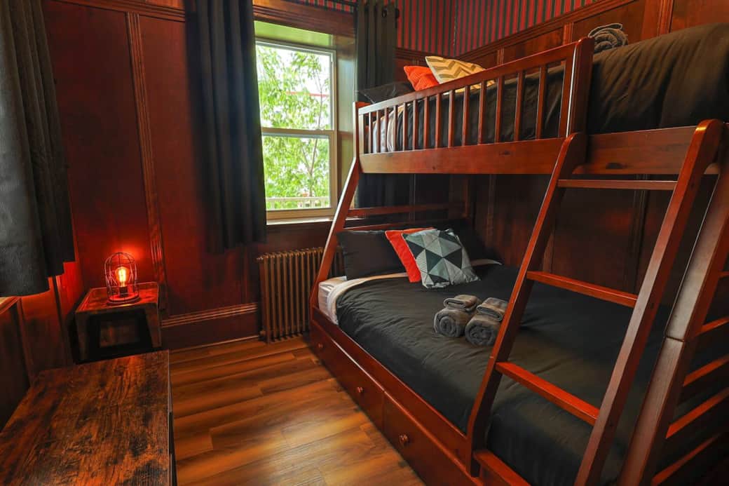 Second Victorian bedroom with double and single bunk bed
