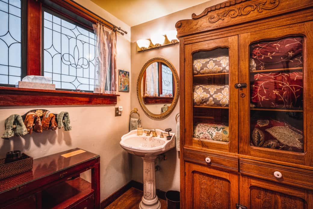 Convenient Downstairs Half Bath Near the Bedroom and Living Area