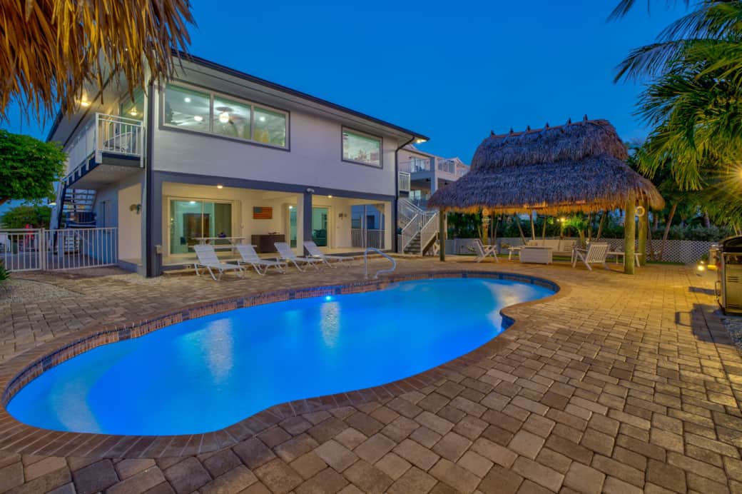 Pool area and tiki hut 1 sunset