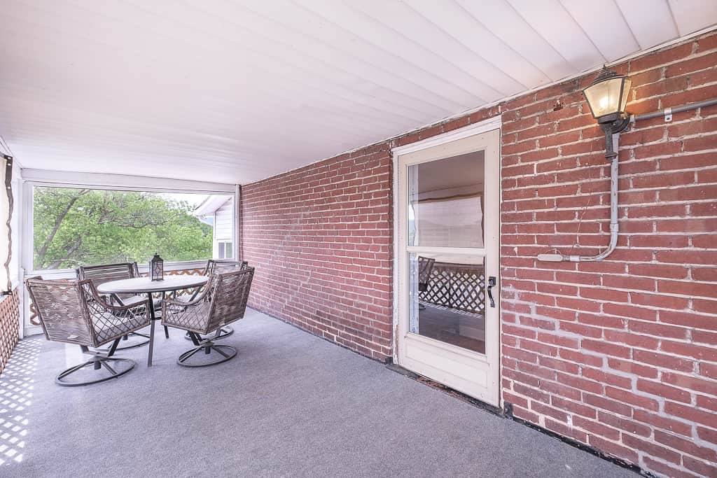 Screened-in porch and front door Screened-in porch and front door