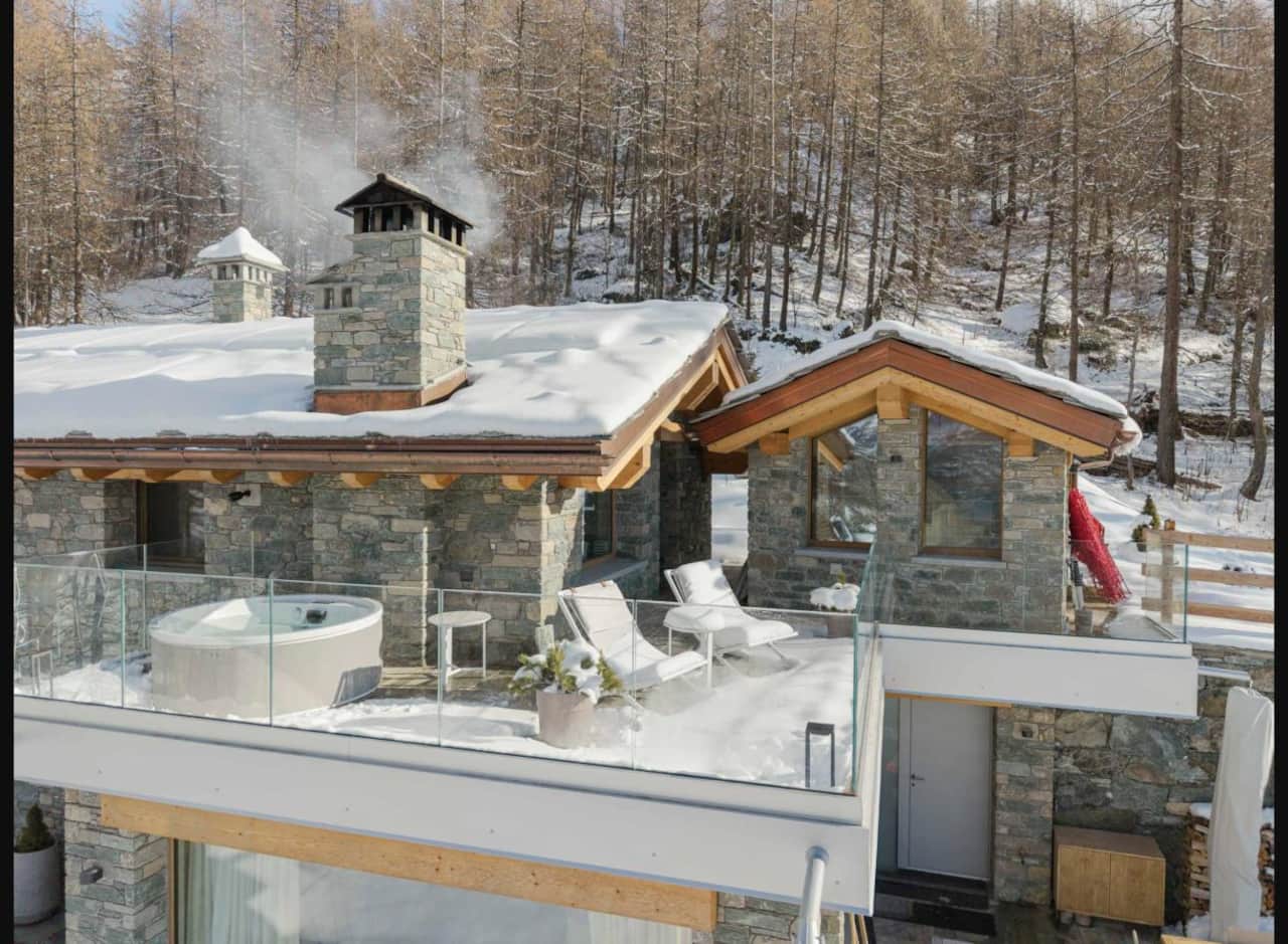 Rooftop terrace with outdoor hot tub and sun loungers