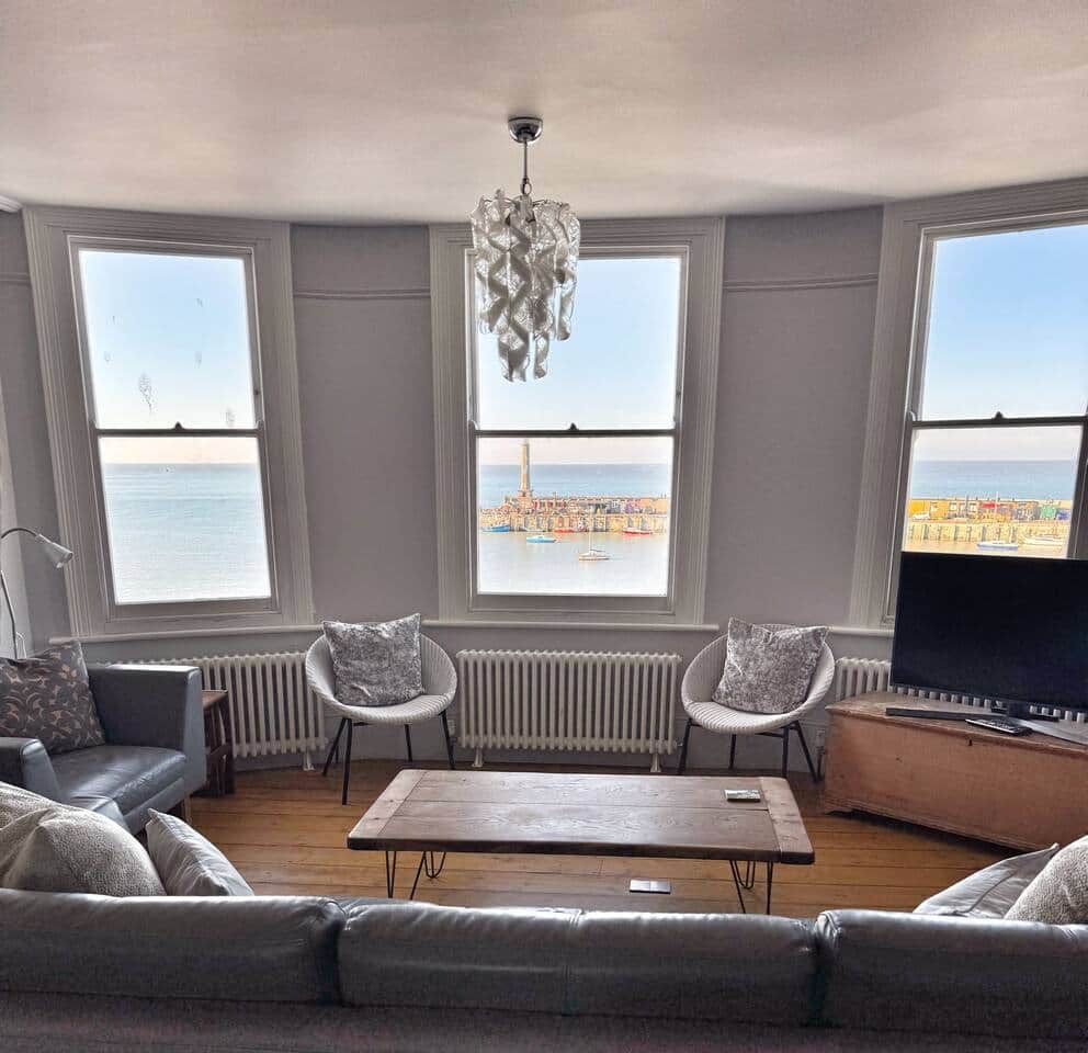 Living room: open plan living room/ dinning room with sea view Living room: open plan living room/ dinning room with sea view