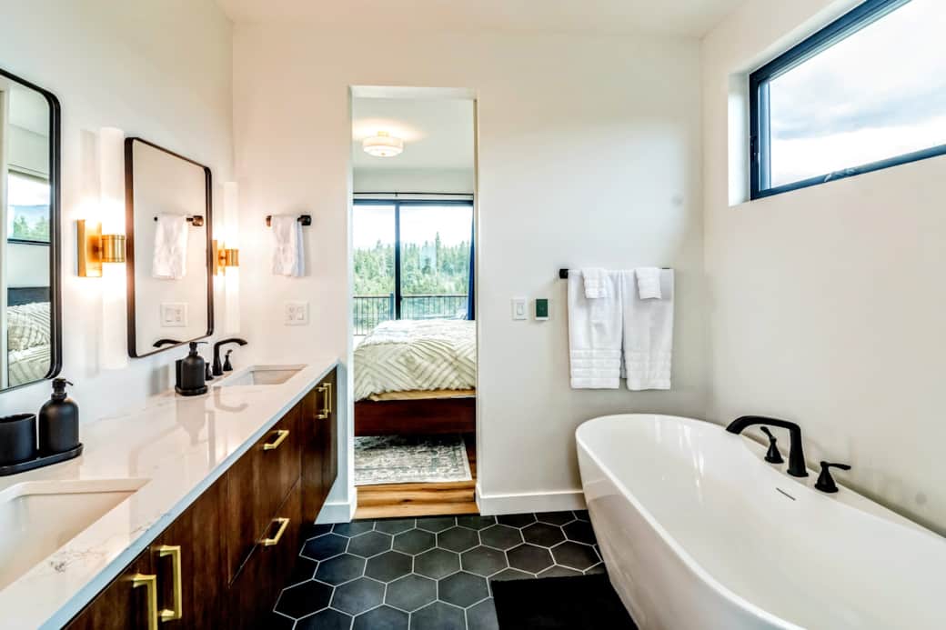 Master Bathroom - Waterfall showerhead, deep soaker tub, & heated floors. Master Bathroom - Waterfall showerhead, deep soaker tub, & heated floors.