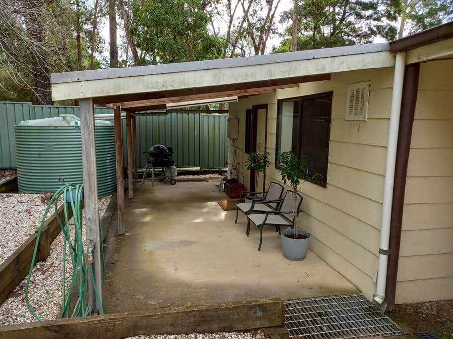 Patio with BBQ. Entrance to property.