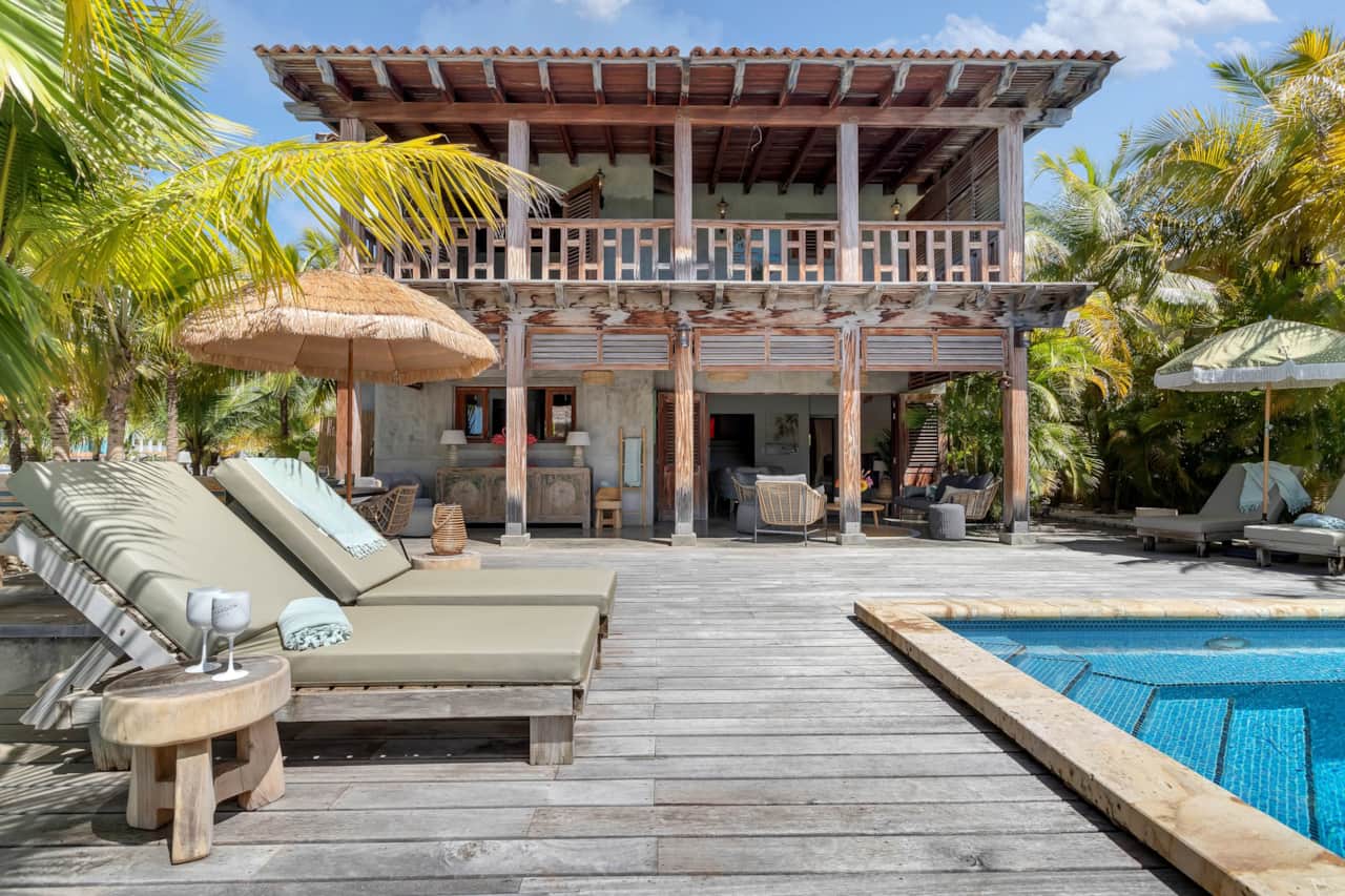 Villa Paradiso Caribbean villa with pool deck and luxury sunbeds