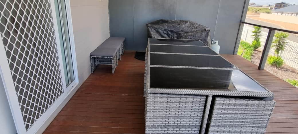 Balcony with BBQ at Wallaroo North Beach holiday home