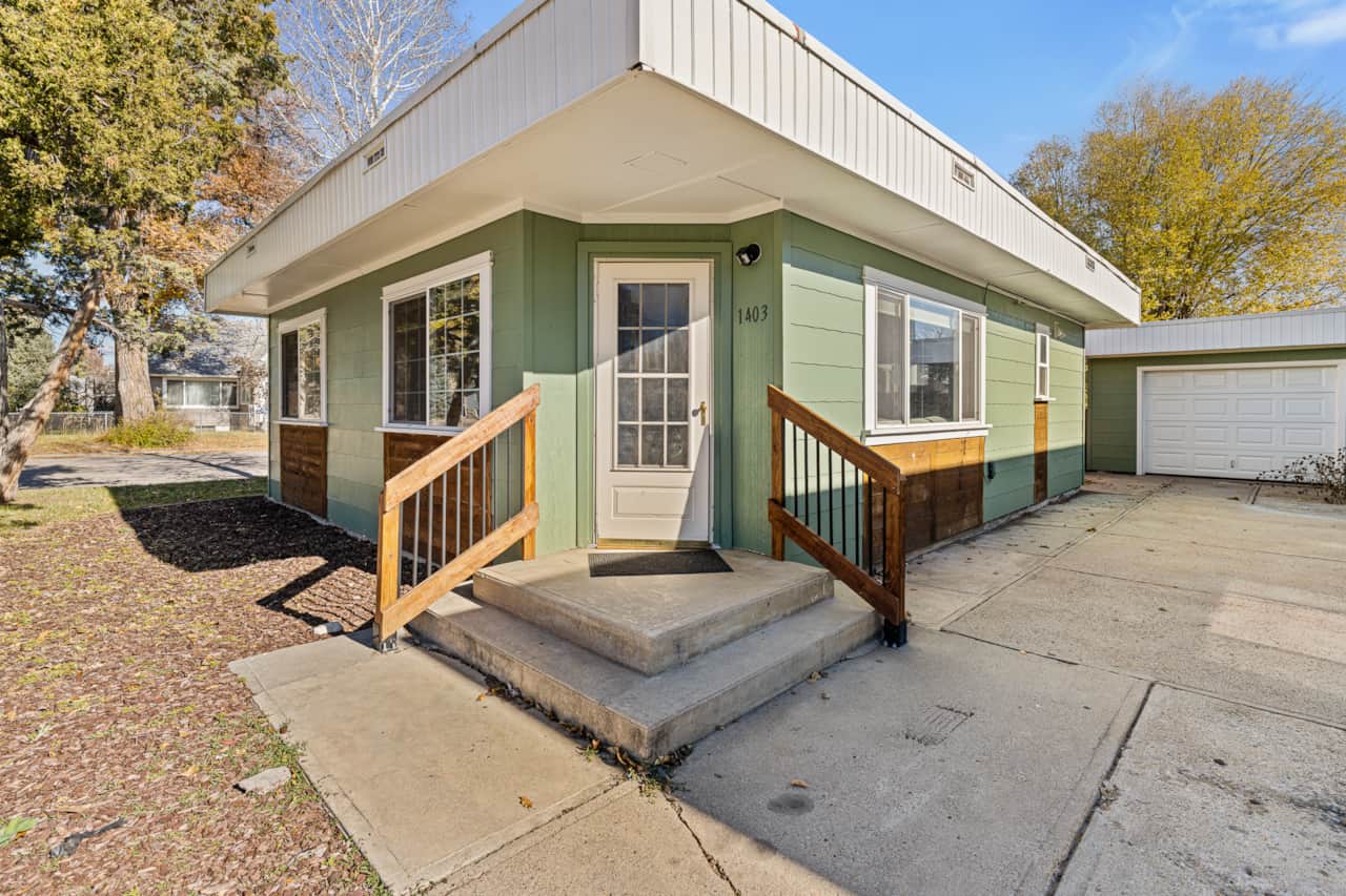 Exterior Entrance: Step up to your charming Wyoming retreat with inviting views and rustic charm!