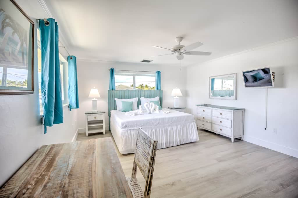  The primary bedroom has a desk for last-minute work, a smart TV and its own en-suite bath.