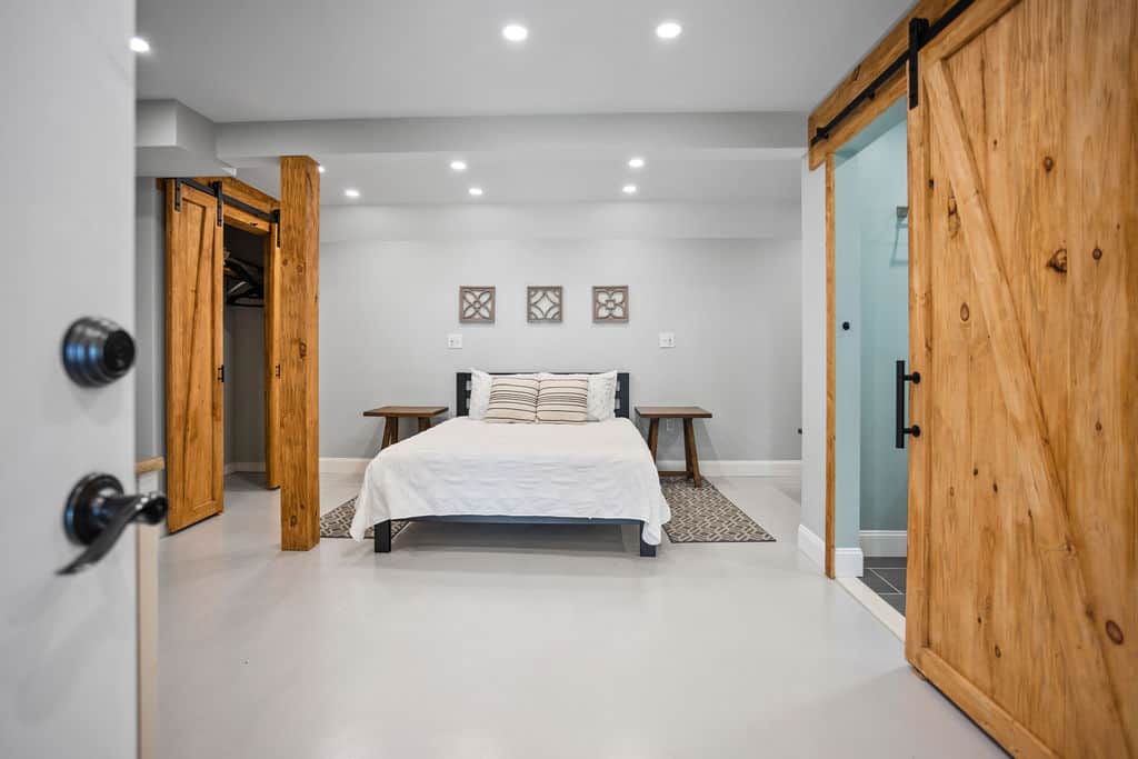 1 Queen Bed, 1 bathroom with walk in shower, small twin sleeper sofa. 