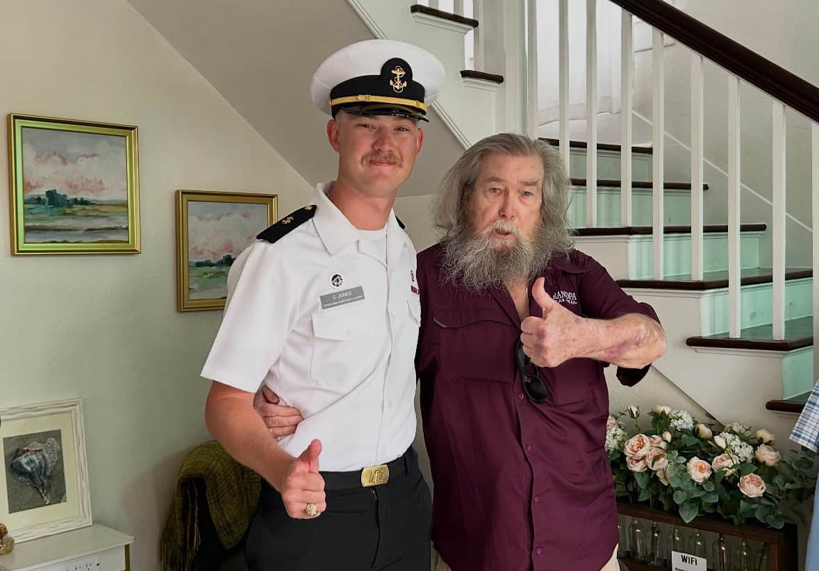 Family celebrating graduation at White Magnolia Galveston