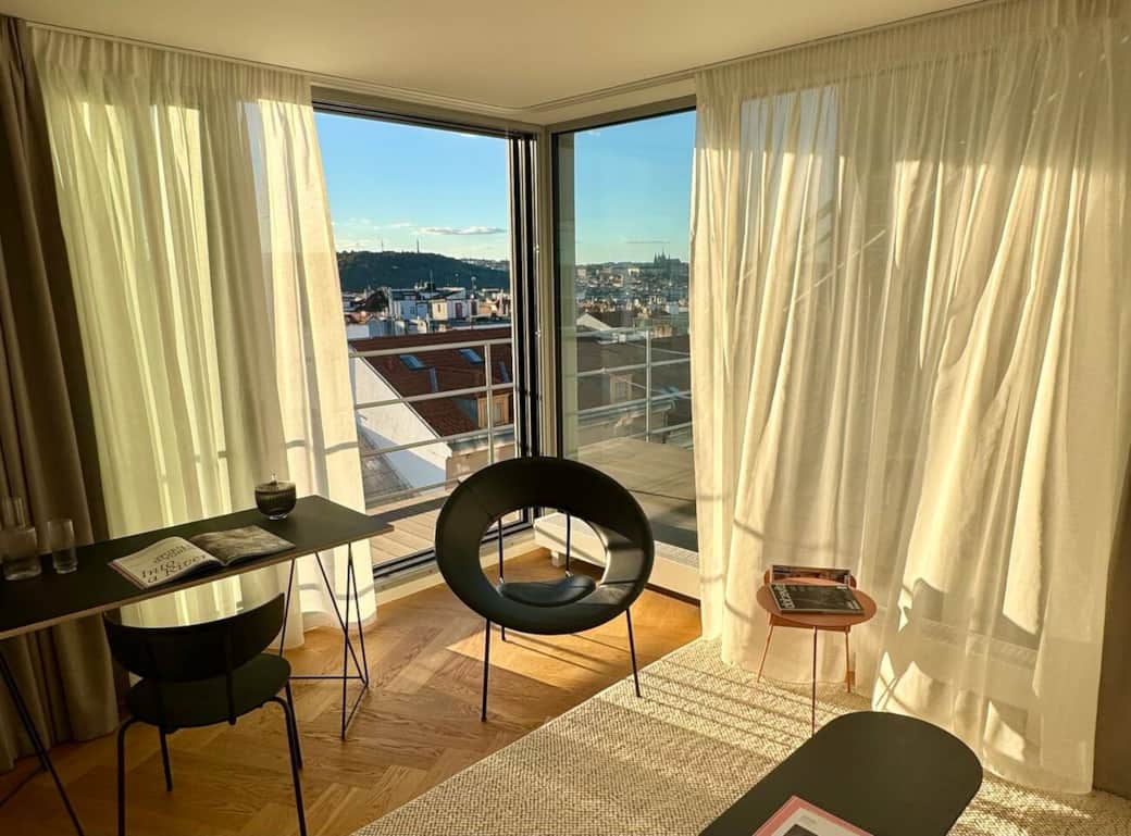 Bedroom with sofa mattress and terrace, overlooking Prague