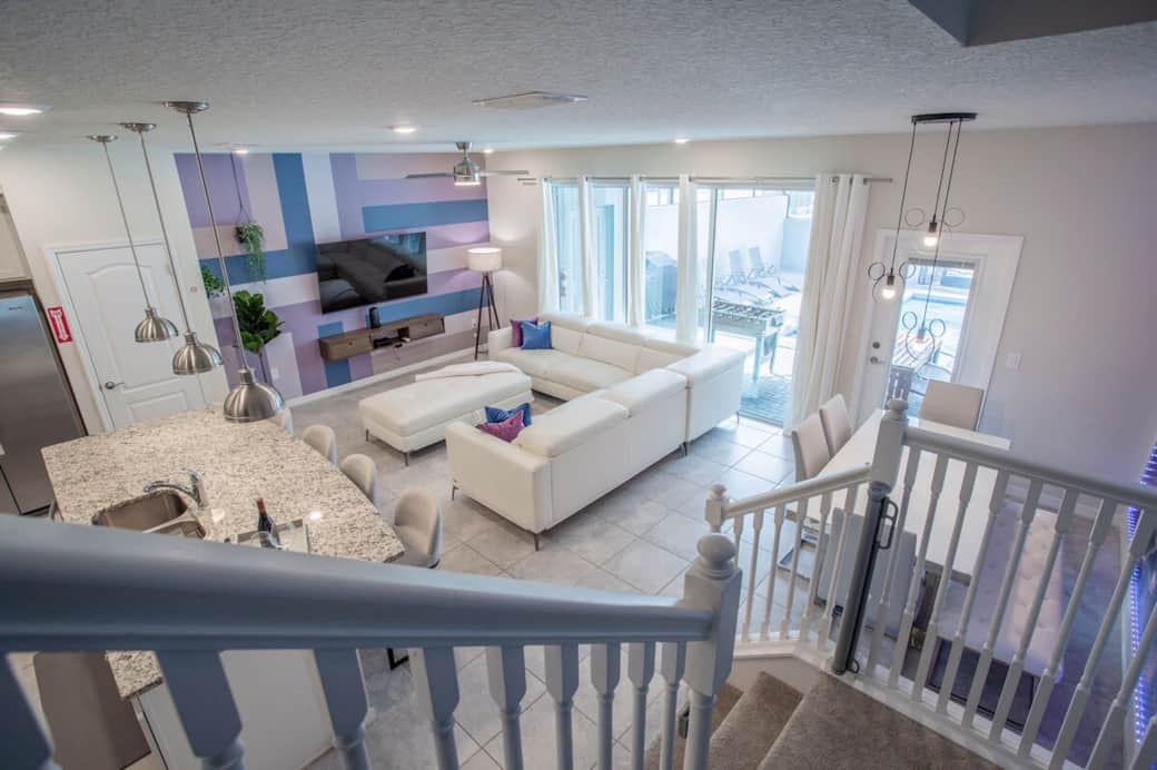 Modern open common area with plenty of natural light. Living room with L-shape couch for the entire family. Smart TV with ROKU to stream your favorite shows. 