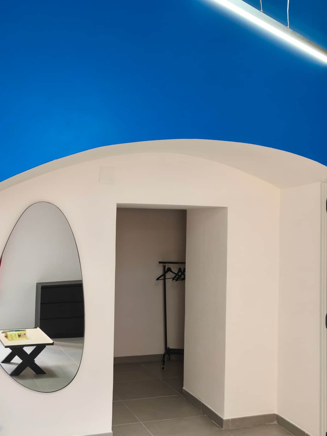 Modern style meets high, historic ceilings in the Agli Archi eco home in Chieti