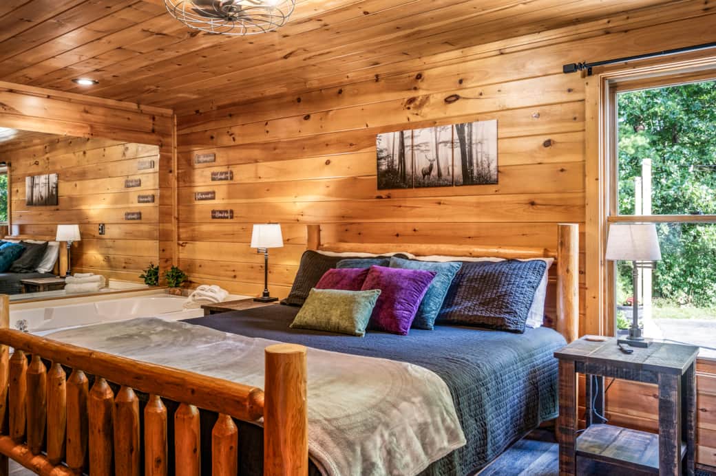 Sleep in rustic comfort—this king log bed pairs mountain charm with modern cabin style.
