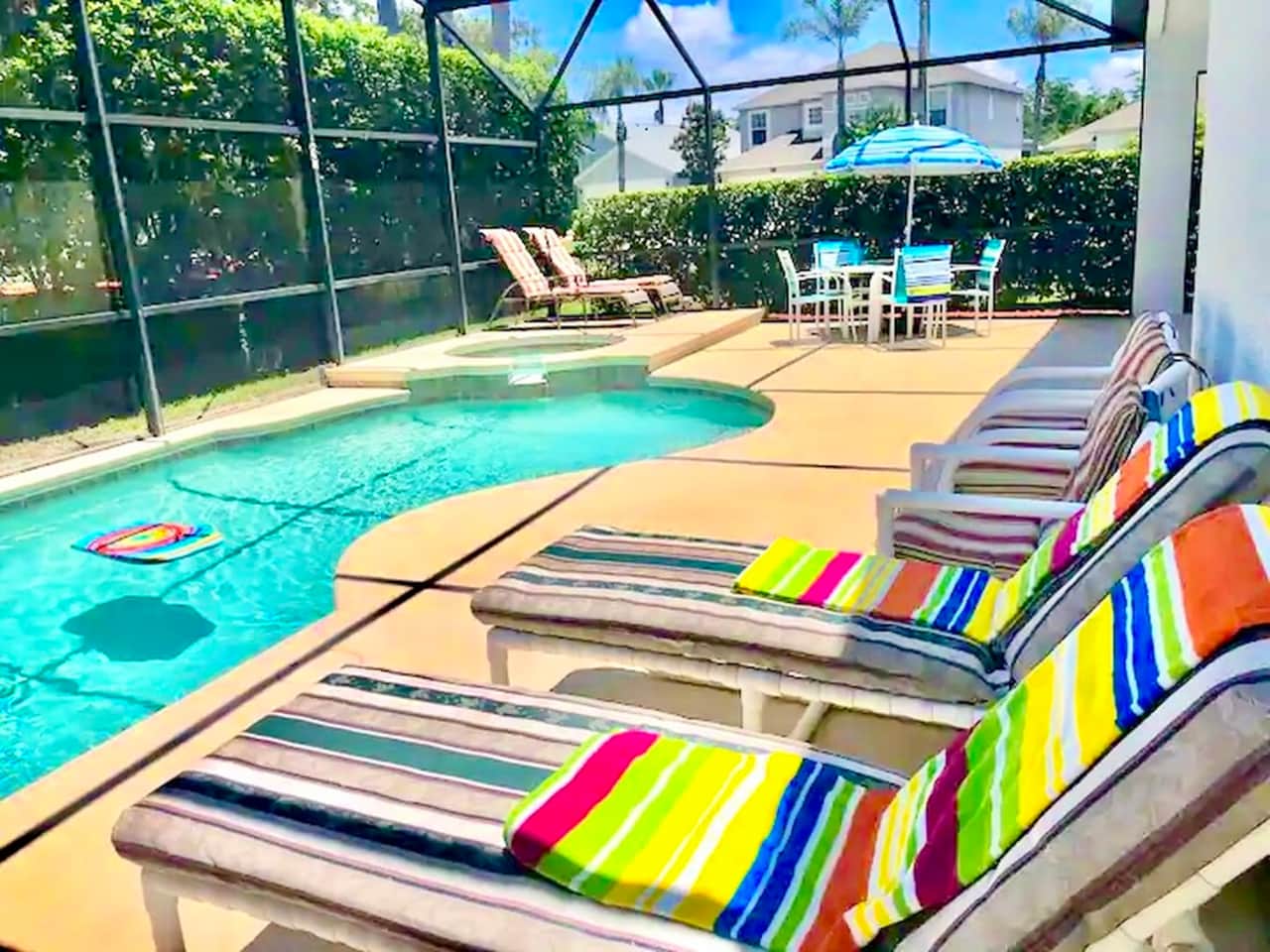 Imagine relaxing here; fully screened pool area