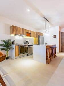 Top-notch appliances: spacious fridge, dishwasher, microwave, and a six-burner stove. 