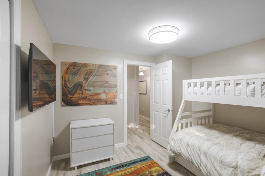 Comfortable bunk bedroom ideal for families, kids, or additional guests.