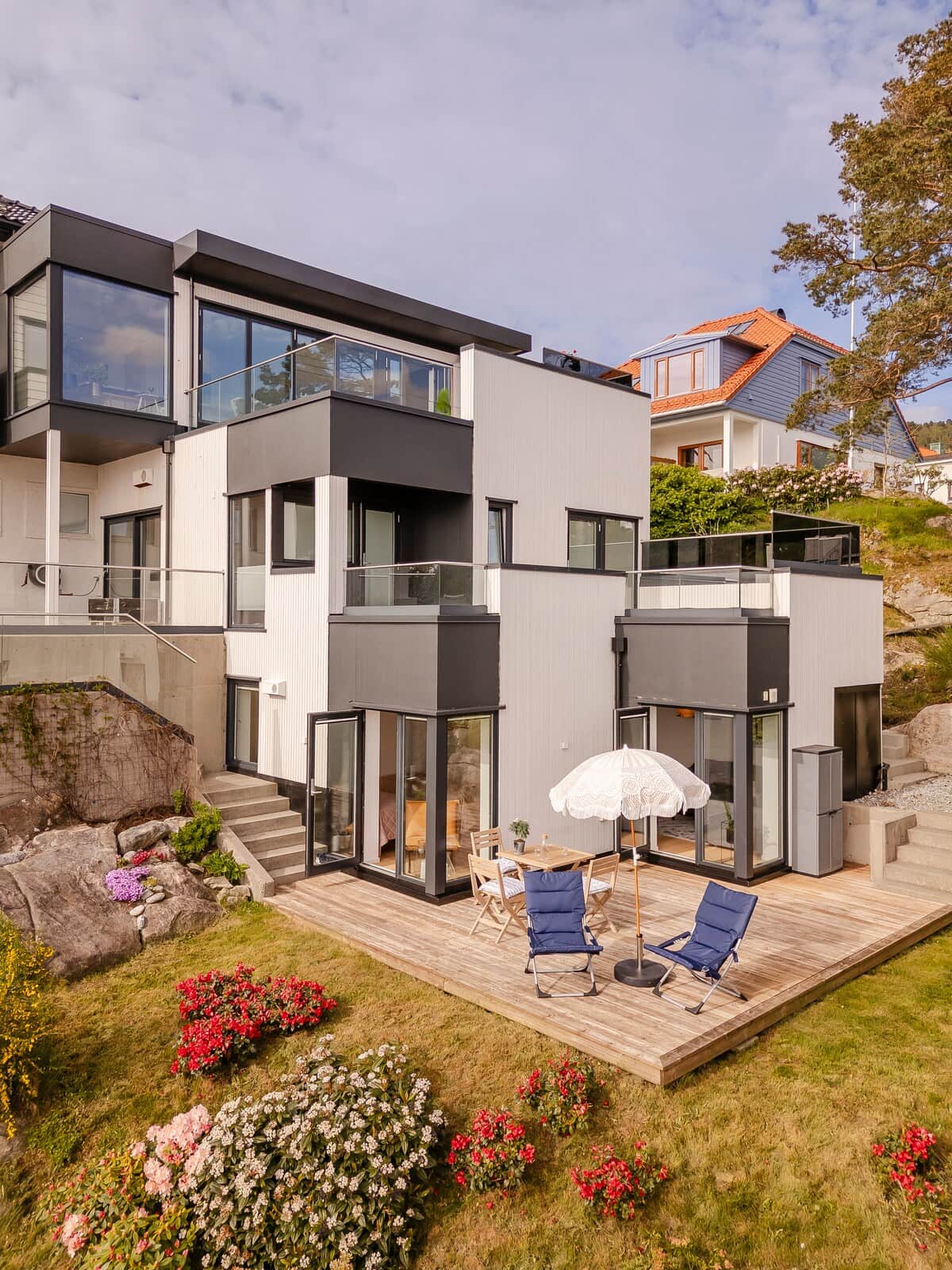 Beautiful terrace with sun loungers and a parasol available