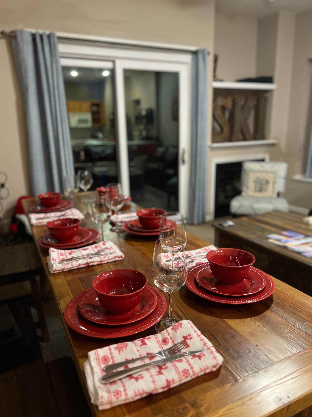 Dinner table - table under TV is on wheels and has stools to fit 6 people 
