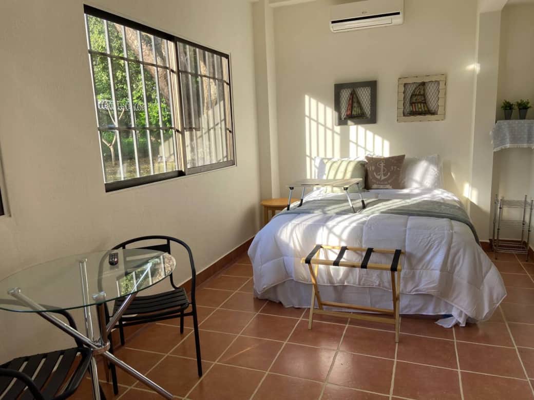 Bed, table and chairs Bed, table and chairs