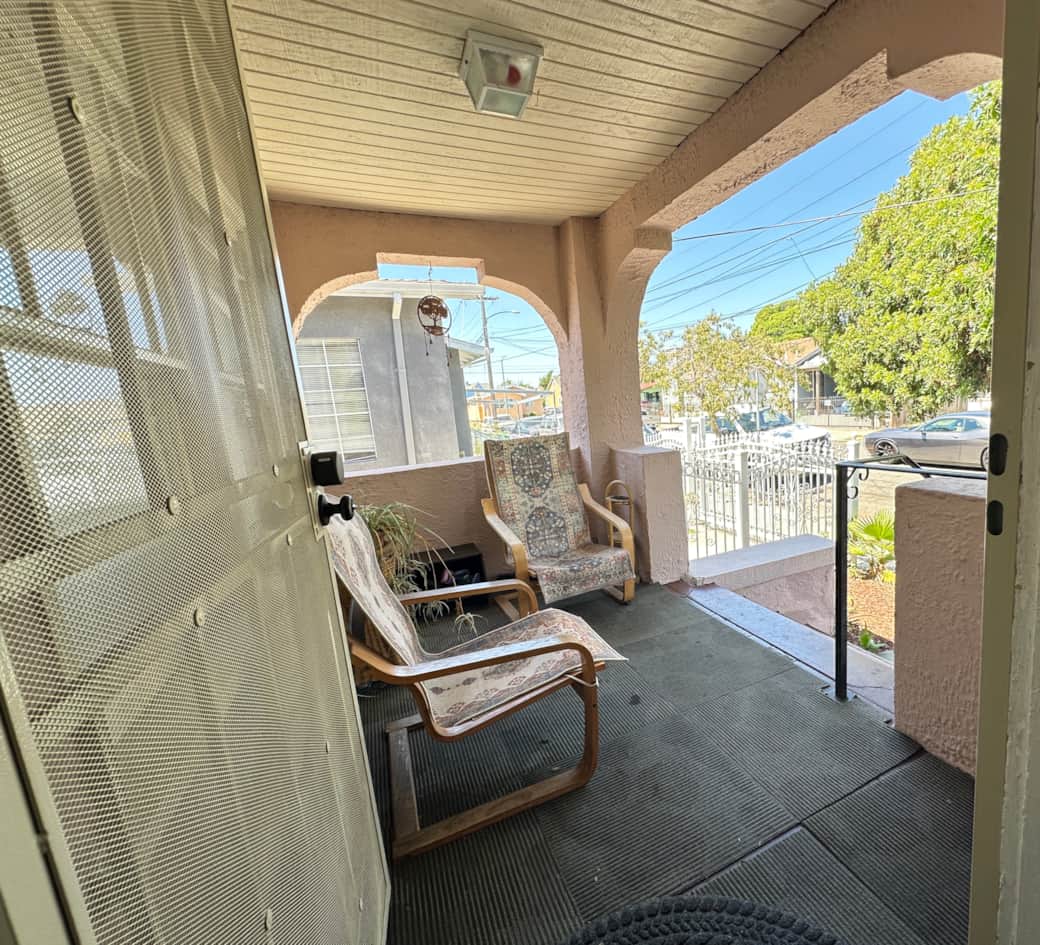 Front porch seating area with chairs