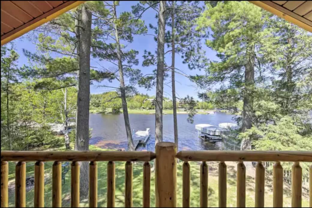 Lofted master suite with private deck overlooking the lake