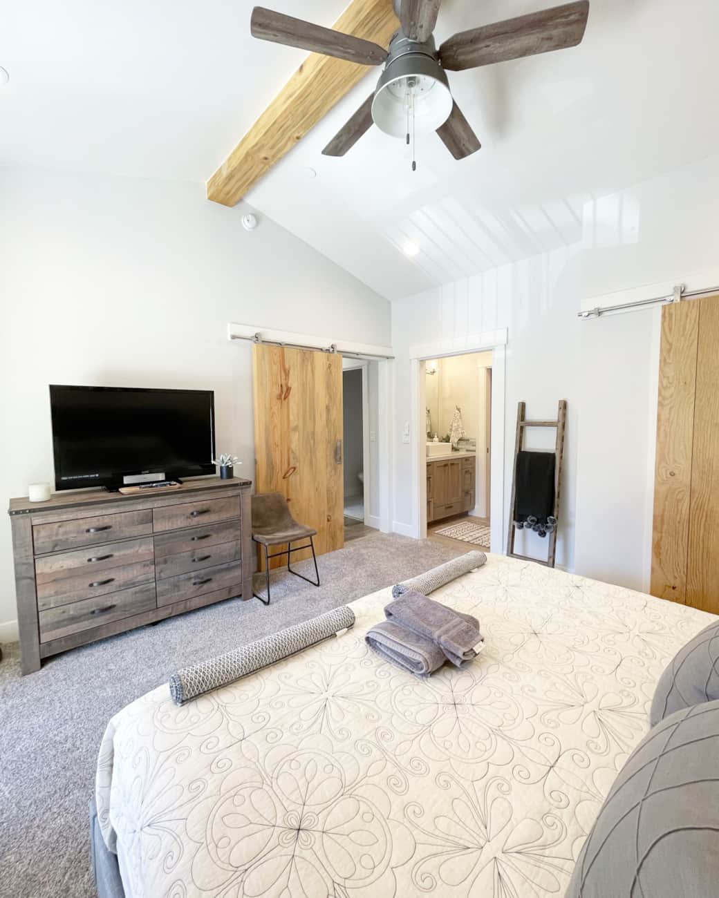 High ceilings and TVs in every room