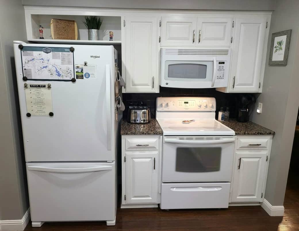 Kitchen with newer refrigerator with ice maker, and a 4 slice toaster. We have oil, spices, salt and pepper if you feel like cooking.