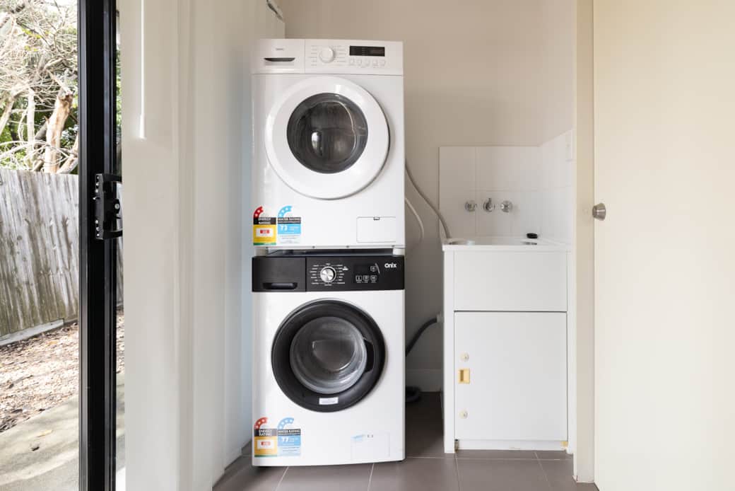 Shared Laundry Area: Washer available for convenient laundry needs
