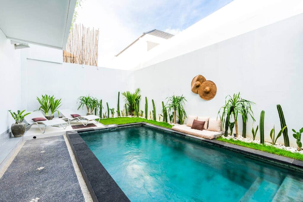 Cool off and take a dip in this stunning outdoor pool area! A perfect spot to relax and unwind.