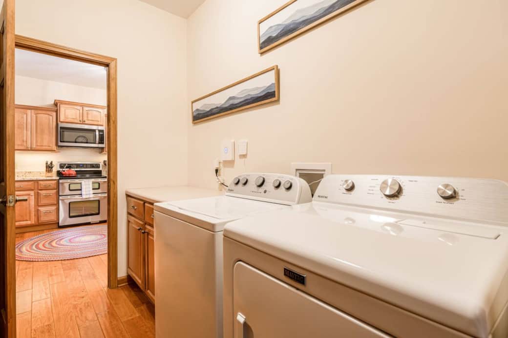 Washer and Dryer Located Centrally in House | Iron & Board | Laundry Detergent