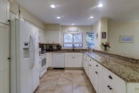 Open kitchen with granite counters at 13 Beach Stop Hilton Head