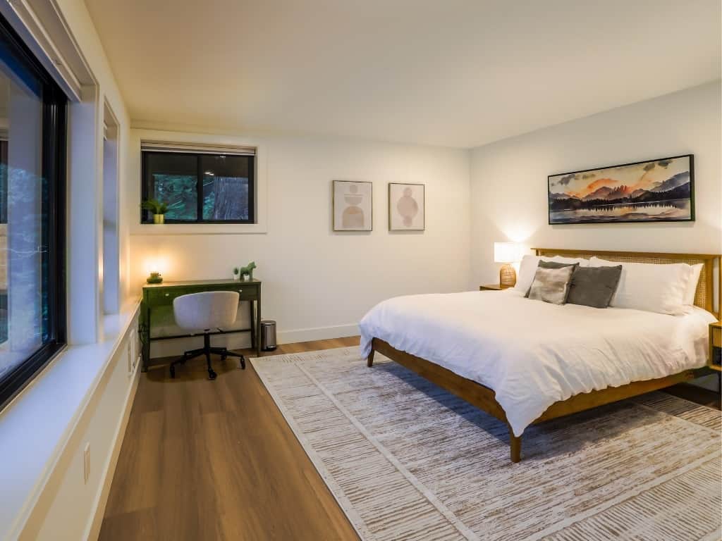 Bedroom downstairs with an amazing lake view. 