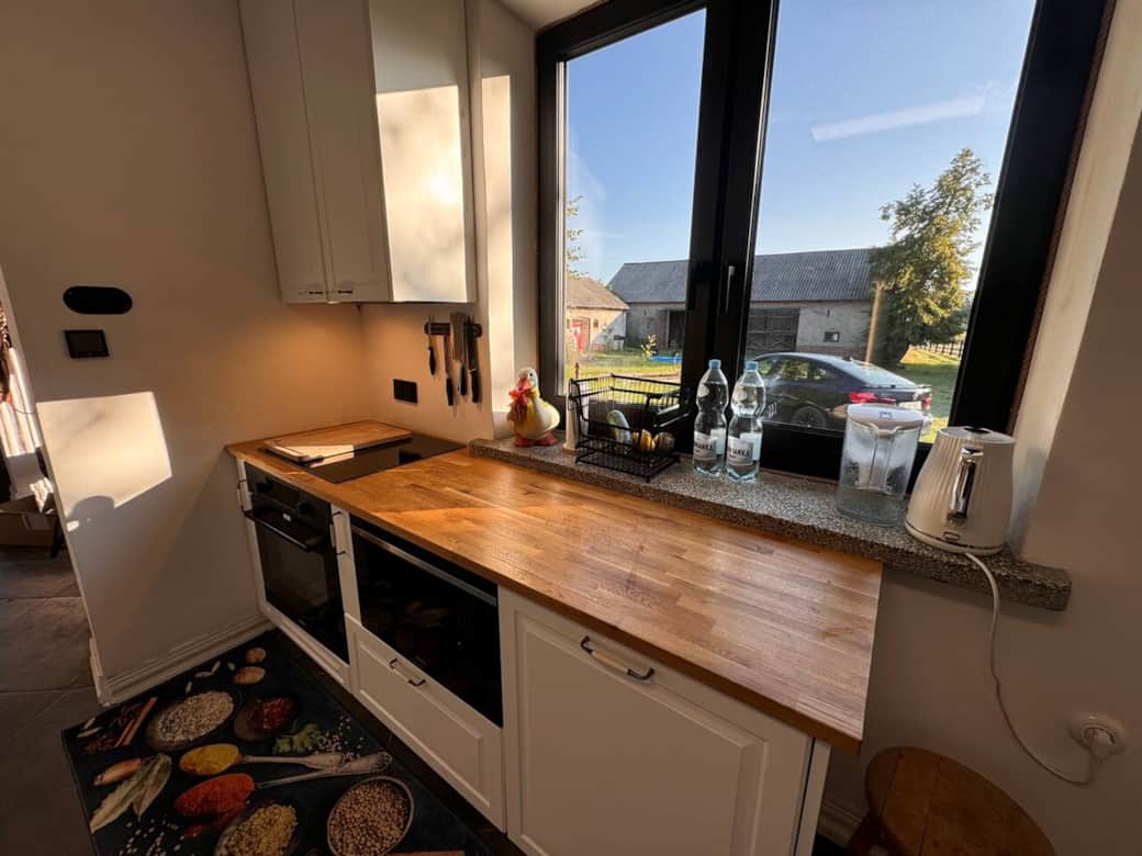 The kitchen has views of the courtyard The kitchen has views of the courtyard