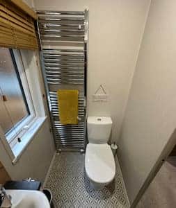 Main shower room next to second bedroom